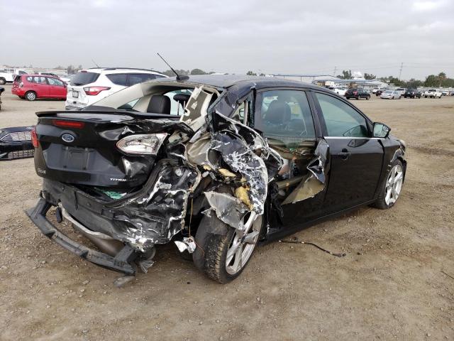 Photo 3 from auction – 2015 FORD FOCUS TITA with VIN 1FADP3J29FL248811