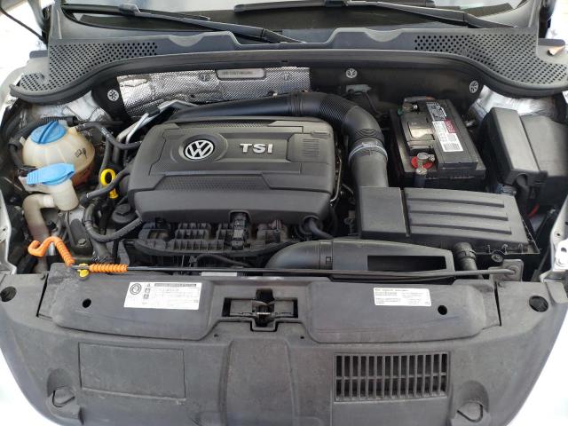 Photo 11 from auction – 2014 VOLKSWAGEN BEETLE with VIN 3VWF17AT7EM659087
