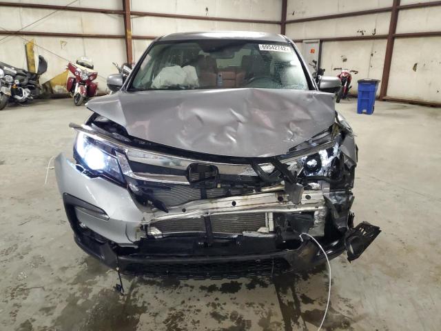 Photo 5 from auction – 2021 HONDA PILOT EXL with VIN 5FNYF5H57MB025970