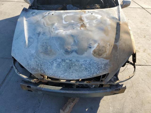 Photo 11 from auction – 2003 TOYOTA CAMRY LE with VIN 4T1BE32K13U260202
