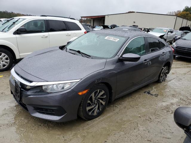 HONDA CIVIC EX 2018 with VIN 2HGFC2F74JH524820 - Photo from auction