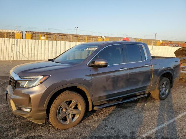 HONDA RIDGELINE 2022 z numerem VIN 5FPYK3F79NB017530 - Zdjęcie z aukcji