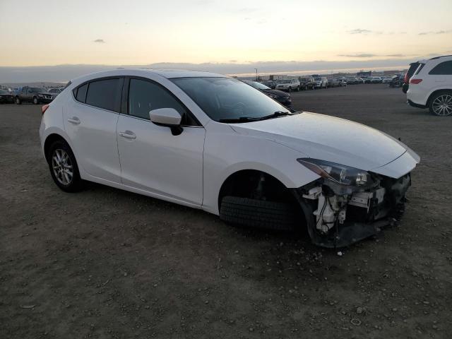 Photo 4 from auction – 2015 MAZDA 3 TOURING with VIN 3MZBM1L73FM170576