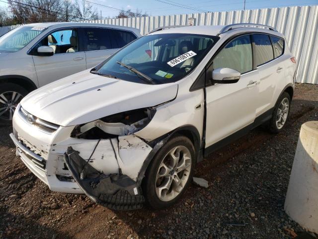 FORD ESCAPE TIT 2014 with VIN 1FMCU9JX4EUA20541 - Photo from auction