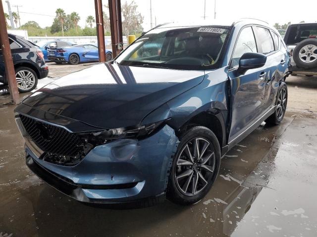 MAZDA CX-5 TOURI 2018 with VIN JM3KFACM3J0409601 - Photo from auction