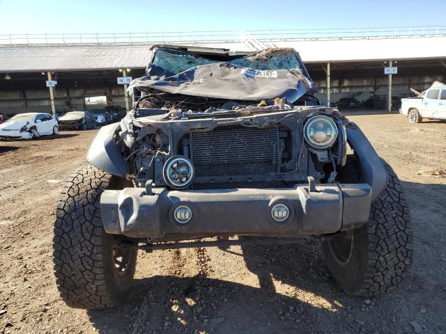 Photo 5 from auction – 2014 JEEP WRANGLER U with VIN 1C4BJWDG5EL125419