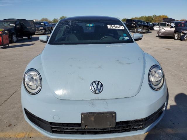 Photo 5 from auction – 2013 VOLKSWAGEN BEETLE with VIN 3VWJX7AT4DM601543