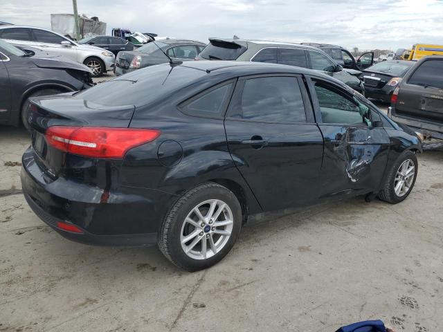 Photo 3 from auction – 2016 FORD FOCUS SE with VIN 1FADP3F25GL266622