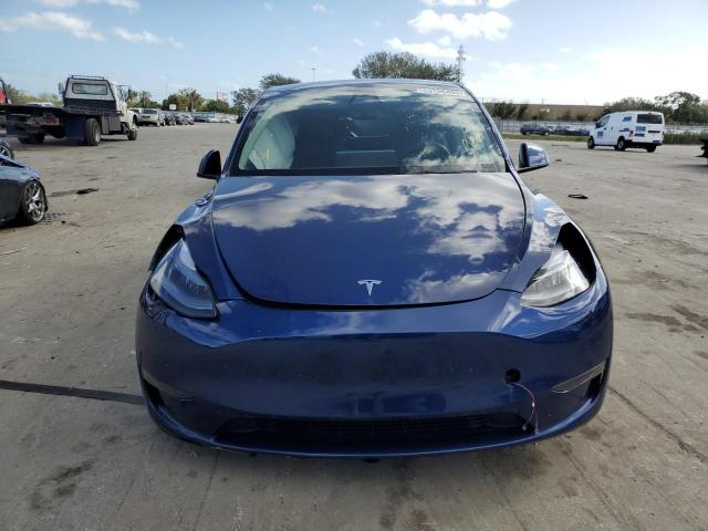 Photo 5 from auction – 2022 TESLA MODEL Y with VIN 7SAYGDEF6NF394411