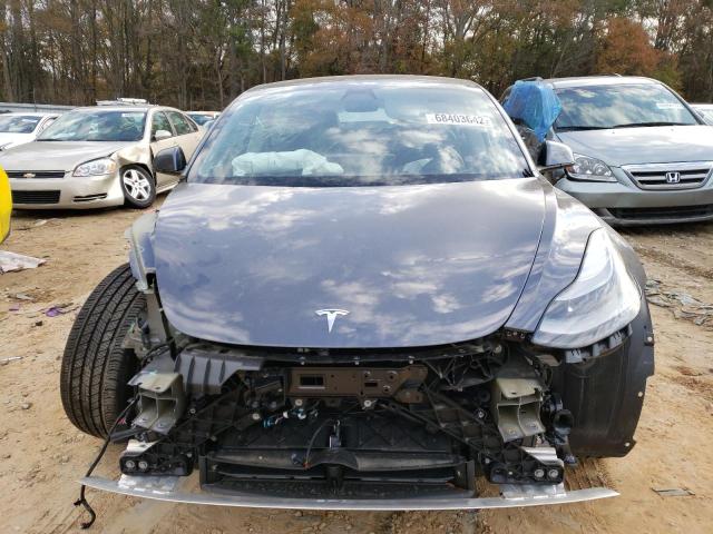 Photo 5 from auction – 2021 TESLA MODEL 3 with VIN 5YJ3E1EBXMF010122