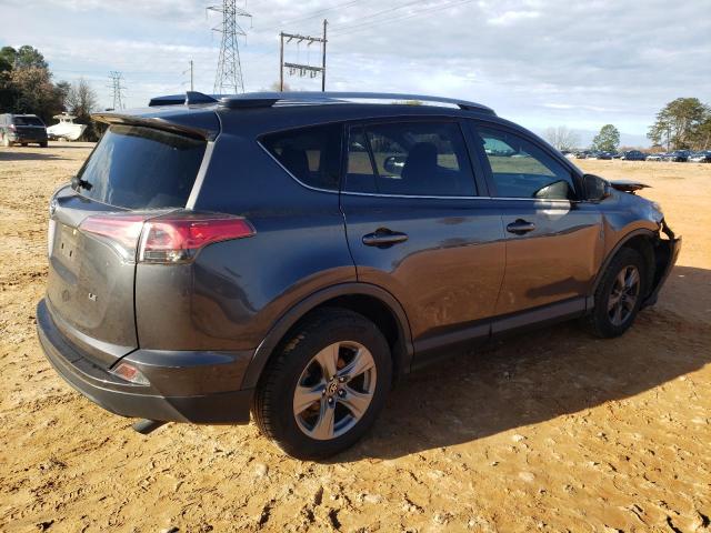 Photo 3 from auction – 2017 TOYOTA RAV4 LE with VIN JTMZFREV0HJ145561