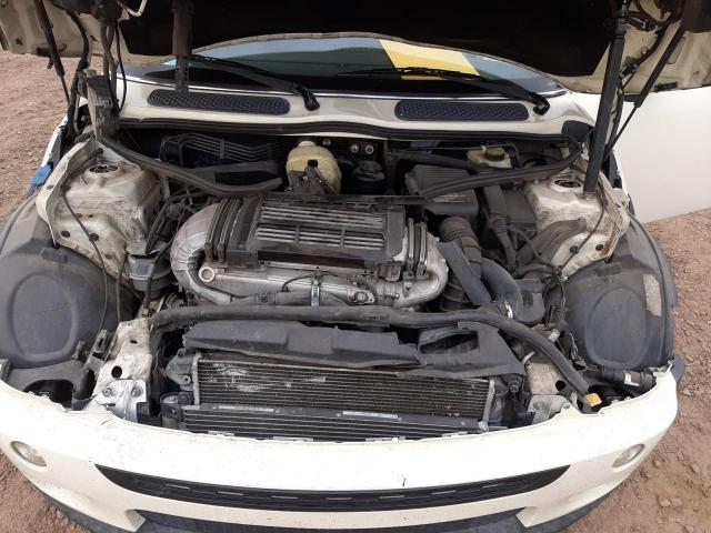 Photo 11 from auction – 2005 MINI COOPER S with VIN WMWRE33475TG95110
