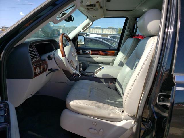 Photo 7 from auction – 2004 LINCOLN NAVIGATOR with VIN 5LMFU27RX4LJ04202