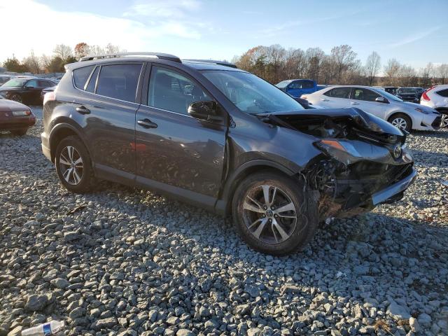 Photo 4 from auction – 2017 TOYOTA RAV4 XLE with VIN JTMWFREV4HD096687