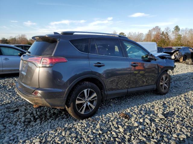 Photo 3 from auction – 2017 TOYOTA RAV4 XLE with VIN JTMWFREV4HD096687