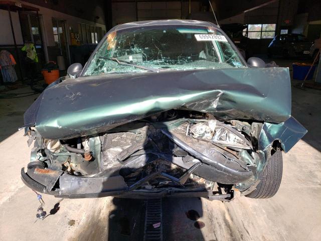 Photo 5 from auction – 1999 FORD ESCORT LX with VIN 1FAFP10P4XW285887