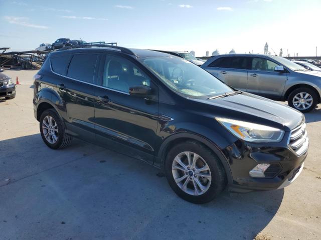 Photo 4 from auction – 2017 FORD ESCAPE SE with VIN 1FMCU0G99HUD81739