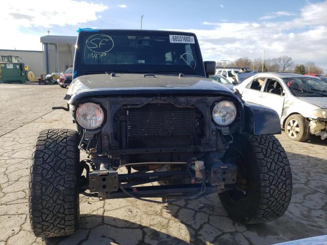 Photo 5 from auction – 2014 JEEP WRANGLER U with VIN 1C4HJWEG9EL180609