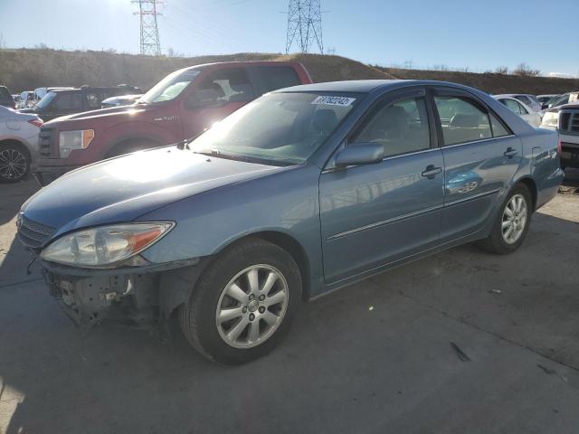 TOYOTA CAMRY LE 2002 with VIN JTDBF30K320053563 - Photo from auction