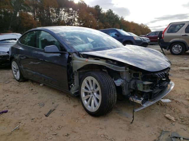 Photo 4 from auction – 2021 TESLA MODEL 3 with VIN 5YJ3E1EBXMF010122