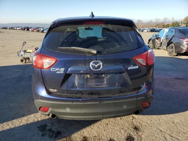 Photo 6 from auction – 2013 MAZDA CX-5 with VIN JM3KE4CE4D0123225