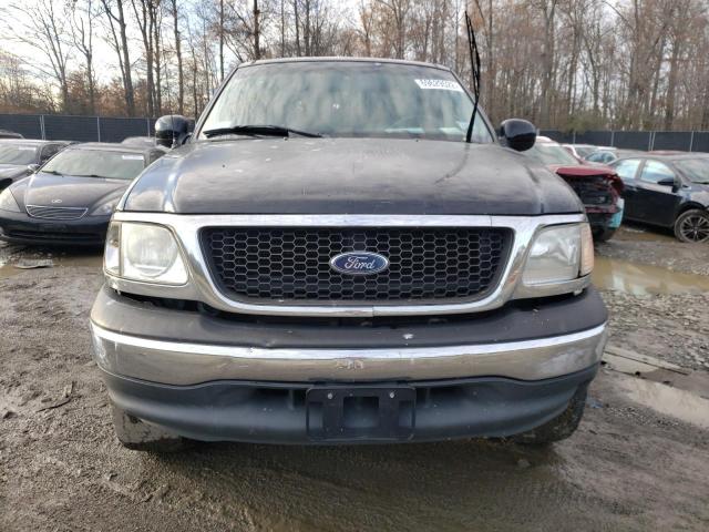 Photo 5 from auction – 2002 FORD F150 with VIN 1FTRX18W32NA35719