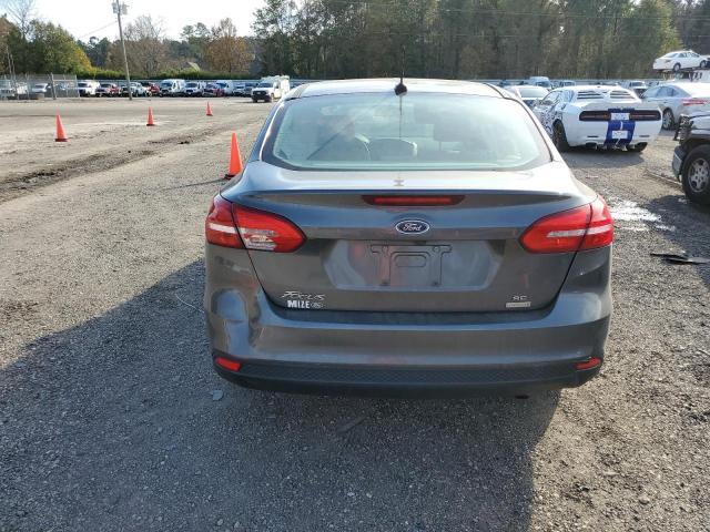 Foto 6 de la subasta – 2018 FORD FOCUS SE con VIN 1FADP3FE9JL219854