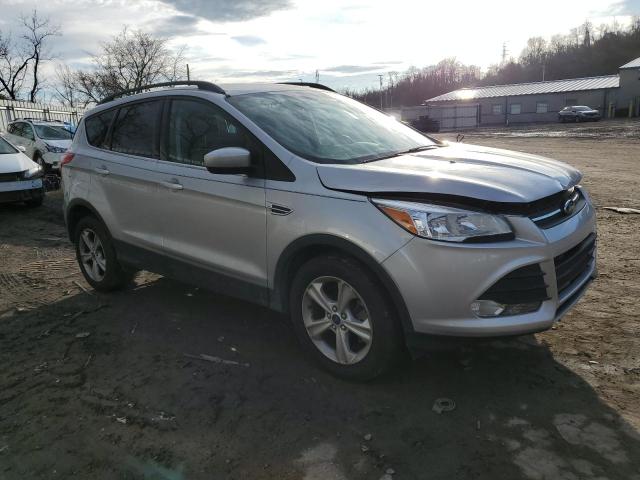 Photo 4 from auction – 2014 FORD ESCAPE SE with VIN 1FMCU9GXXEUD99472