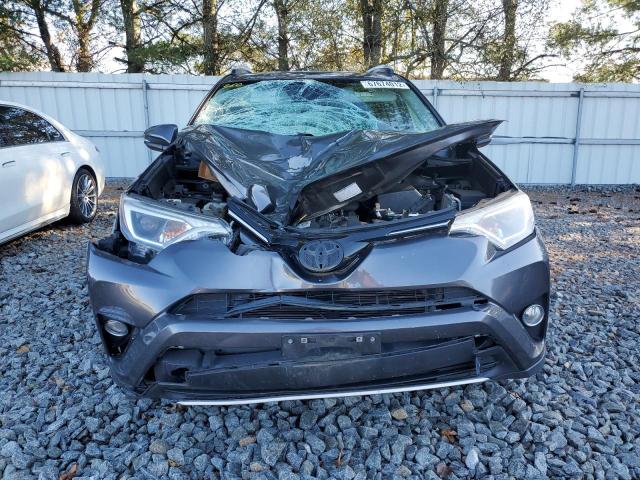 Photo 5 from auction – 2016 TOYOTA RAV4 XLE with VIN JTMRFREV6GJ077250