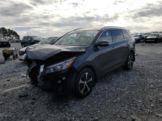 KIA SORENTO EX 2016 with VIN 5XYPH4A55GG084801 - Photo from auction