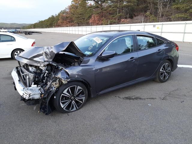 HONDA CIVIC EX 2016 with VIN 2HGFC1F3XGH636621 - Photo from auction