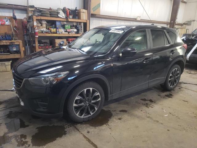 MAZDA CX-5 GT 2016 with VIN JM3KE4DY9G0758163 - Photo from auction