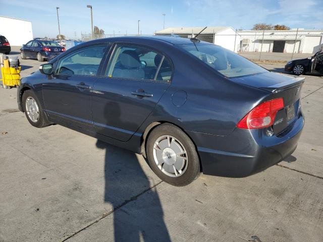 Photo 2 from auction – 2010 HONDA CIVIC HYBR with VIN JHMFA3F29AS004859