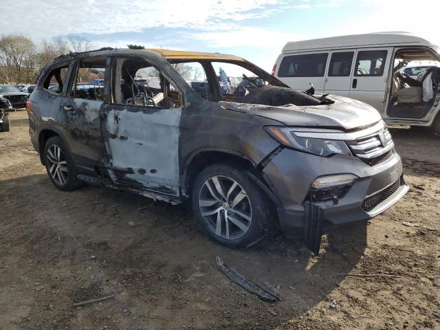 Photo 4 from auction – 2017 HONDA PILOT ELIT with VIN 5FNYF6H0XHB020309