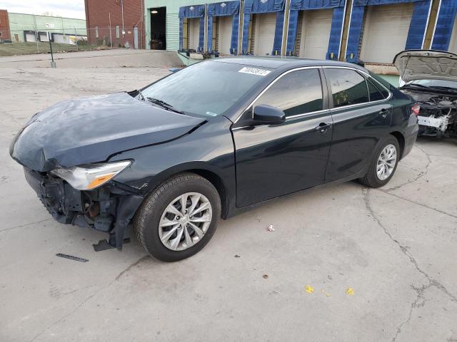 TOYOTA CAMRY LE 2017 with VIN 4T1BF1FK7HU704279 - Photo from auction