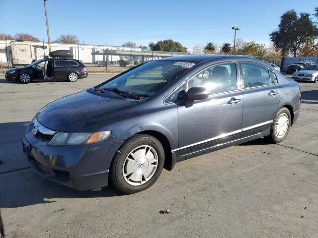 HONDA CIVIC HYBR 2010 with VIN JHMFA3F29AS004859 - Photo from auction