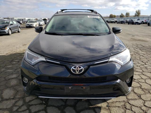 Photo 5 from auction – 2016 TOYOTA RAV4 XLE with VIN 2T3RFREV8GW409755