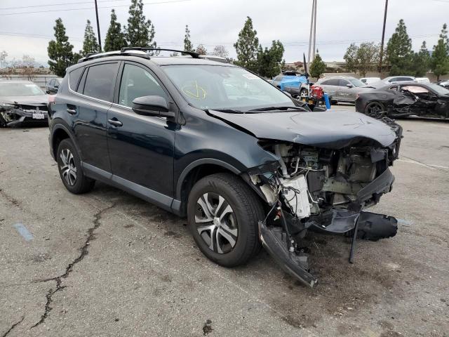 Photo 4 from auction – 2018 TOYOTA RAV4 LE with VIN 2T3ZFREV2JW488279
