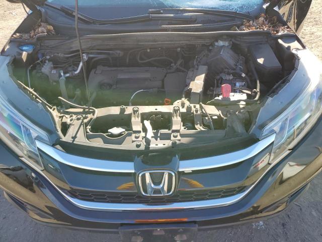 Photo 11 from auction – 2015 HONDA CR-V LX with VIN 5J6RM4H35FL097053