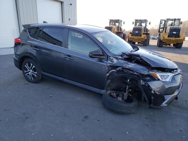 Photo 4 from auction – 2018 TOYOTA RAV4 LE with VIN JTMBFREV7JJ232462