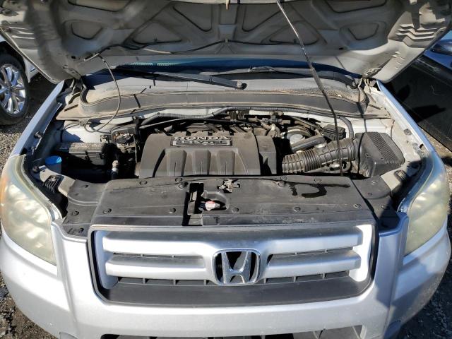 Photo 12 from auction – 2006 HONDA PILOT EX with VIN 5FNYF28706B002338