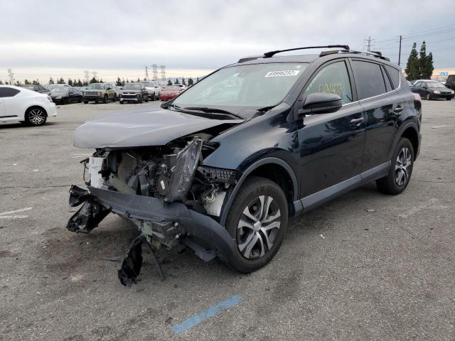 TOYOTA RAV4 LE 2018 with VIN 2T3ZFREV2JW488279 - Photo from auction