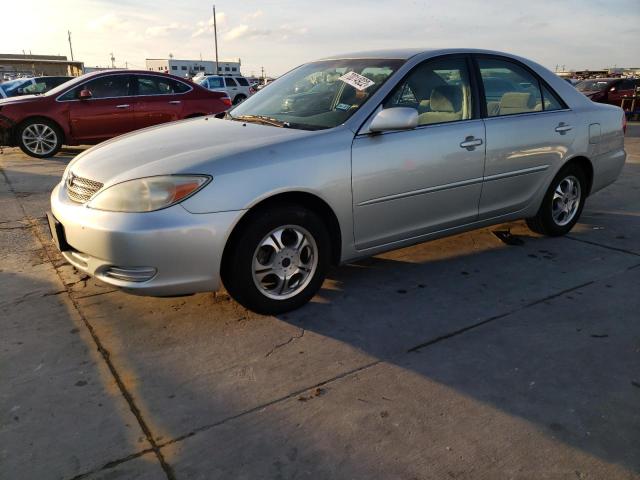 TOYOTA CAMRY LE 2002 with VIN JTDBE32K920077785 - Photo from auction