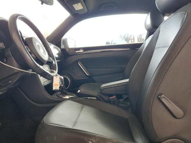 Photo 7 from auction – 2014 VOLKSWAGEN BEETLE with VIN 3VWJ17AT1EM637743