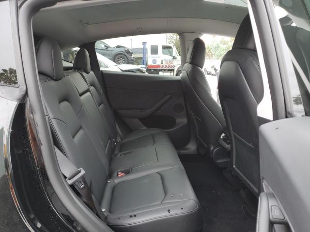 Photo 11 from auction – 2022 TESLA MODEL Y with VIN 7SAYGDEF4NF521110
