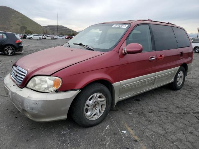 KIA SEDONA EX 2002 with VIN KNDUP131226256874 - Photo from auction