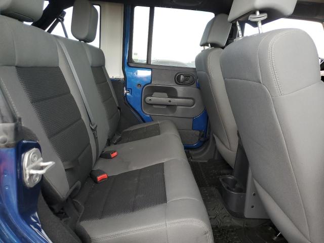 Photo 11 from auction – 2009 JEEP WRANGLER U with VIN 1J4GA39129L722956