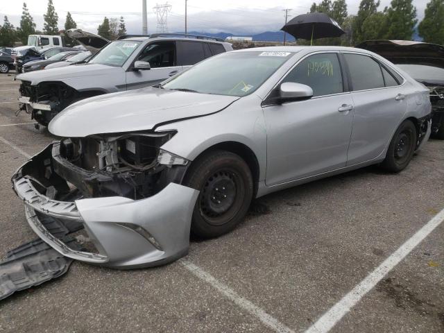 TOYOTA CAMRY LE 2016 with VIN 4T1BF1FKXGU506116 - Photo from auction