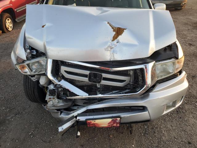 Photo 11 from auction – 2011 HONDA RIDGELINE with VIN 5FPYK1F55BB452298