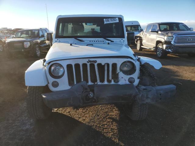 Photo 5 from auction – 2016 JEEP WRANGLER U with VIN 1C4BJWEG4GL231877